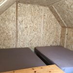 Intérieur des prêts-à-camper/glamping nommés tentes boréales disponibles à la location au Camping du Domaine Lausanne